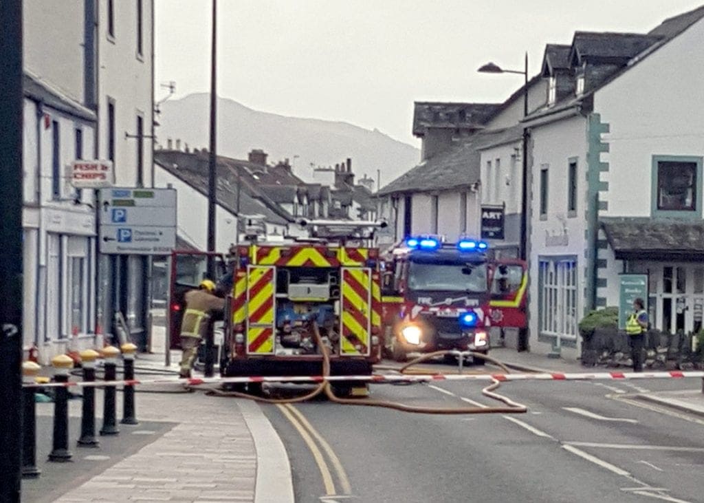 Firefighters outside the Kingfisher fish and chip shop in Keswick on Friday 22nd May 2020. Photo Robert Royall.