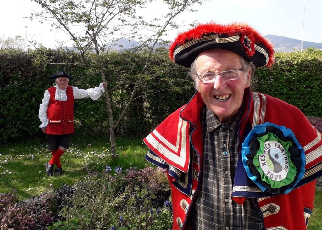 Ex-Keswick town crier Bob Bryden with current incumbent and fellow joke teller Dave Hall (background)
