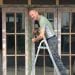 Volunteer Jonathan Moore at work at the entrance to Keswick's Alhambra cinema