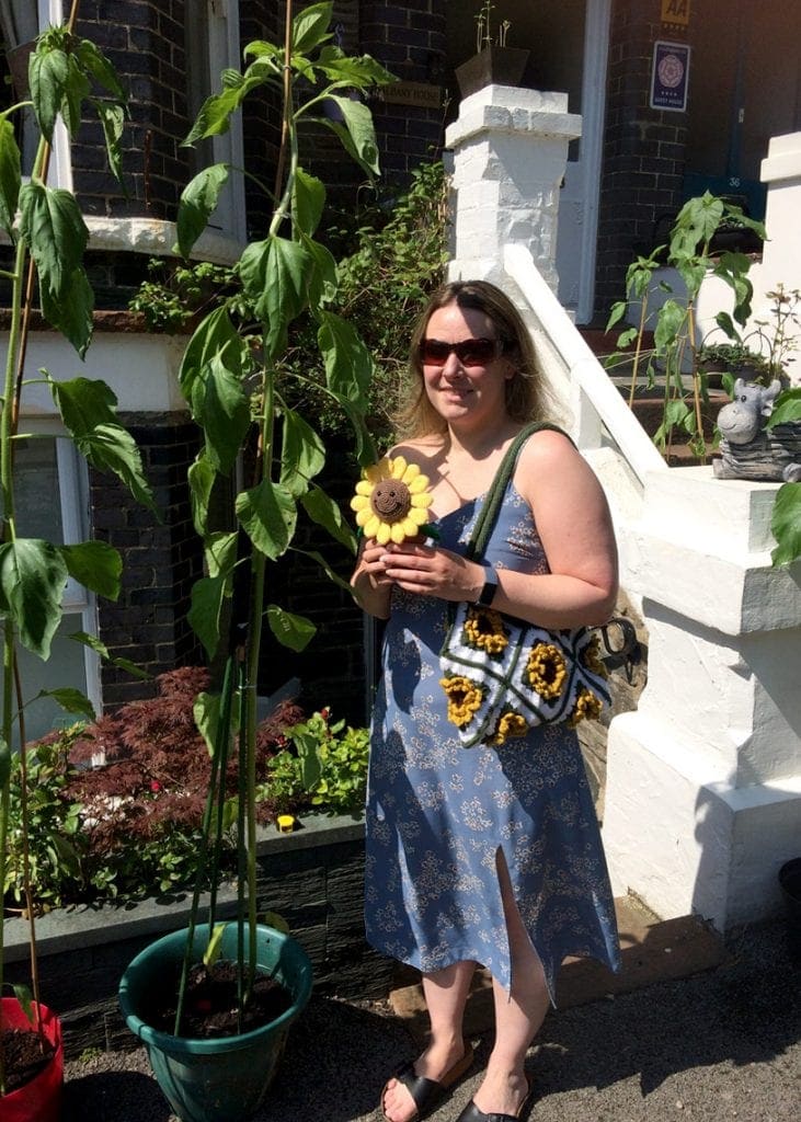 Claire Peat from Keswick with the 6ft sunflower she has grown