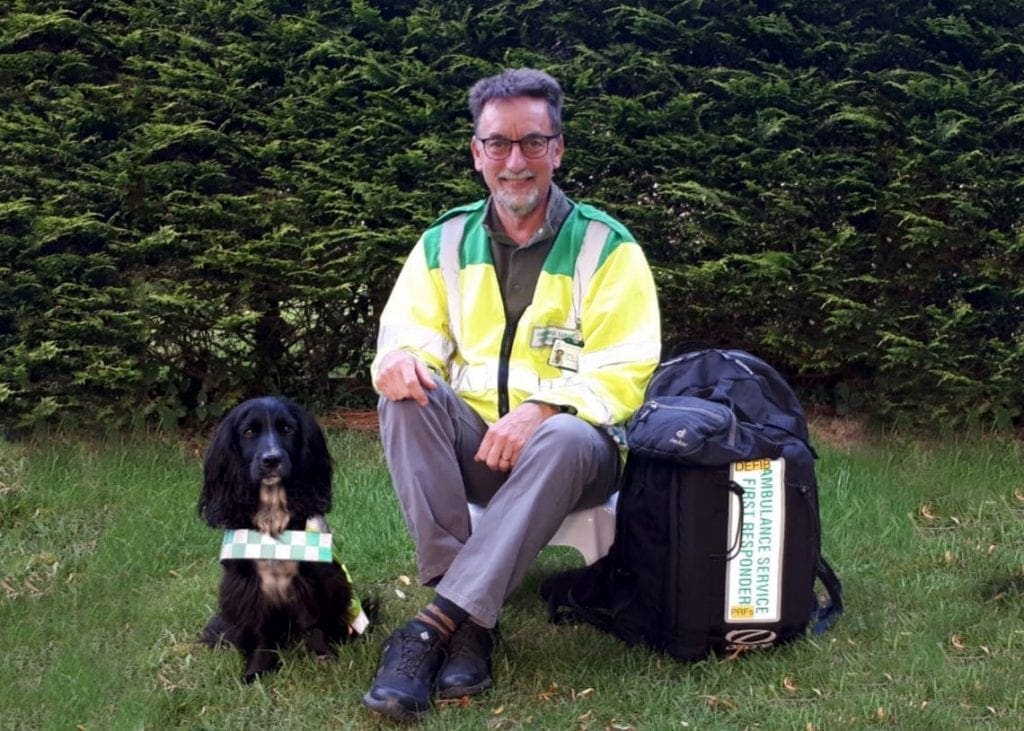 Nick Ball with his First Responder kit and Theo the dog, Keswick First Responders' mascot