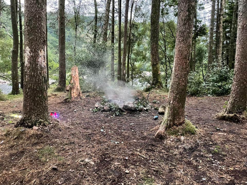 Youths throw gas canisters onto fire on Thirlmere island. Picture: Keswick Fire Station