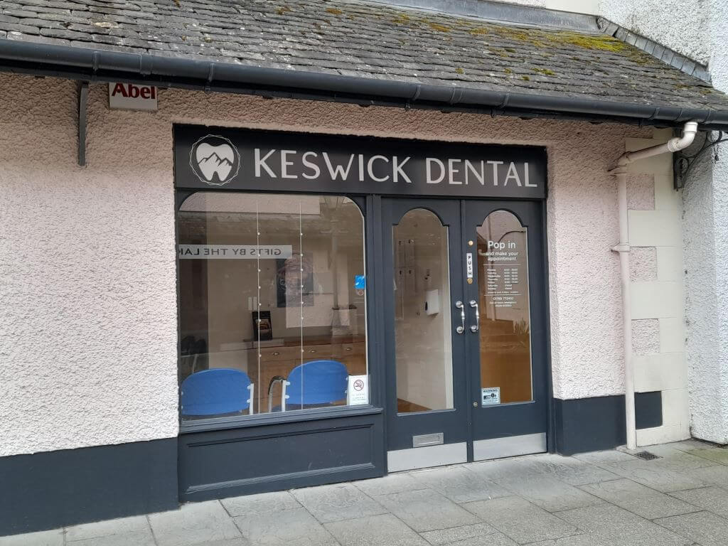 Cream and dark grey shop front